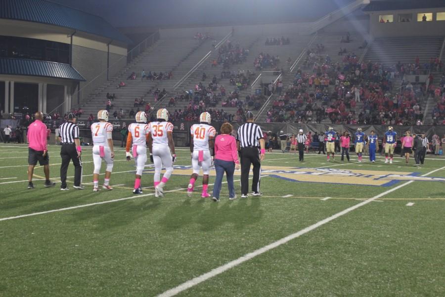 NC played the McEachern Indians at last Friday’s varsity football game. As a part of breast cancer awareness, the Falcons sponsored a pink-out and encouraged the football players from both teams to sport pink gear. 