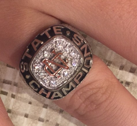 Parrish flaunts her state championship ring, representing NC’s only athletic championship within the last 30 years.