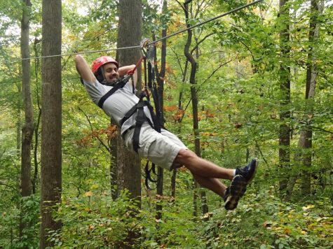 Huff "hangs out" with the team by ziplining during last year's trip to Furman University.