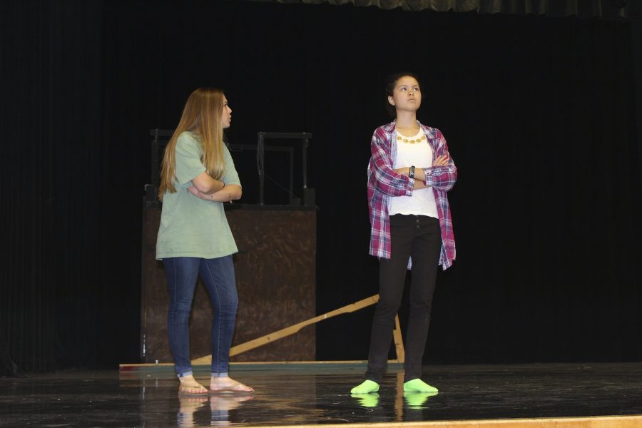Sophomores Isabella Keaton (Norma Henshaw) and Hope Kutsche (Luella Bennett) bicker onstage as they rehearse the show.