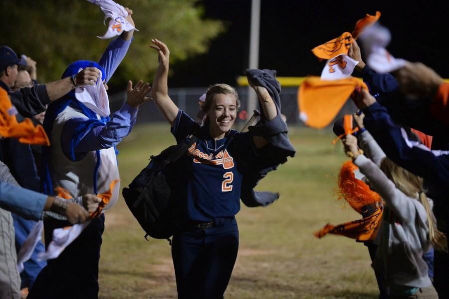 Senior Casey Page celebrates the end of a triumphant season with the team’s supporters. 