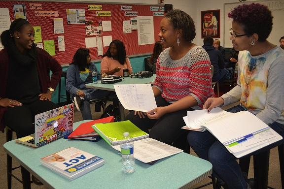 (From left to right) Kelsey Davis, Imani Holmes, and Remy Usman work hard to prepare for the final round of interviews for The POSSE foundation. They are determined to win the full scholarship to one of the partner schools.
