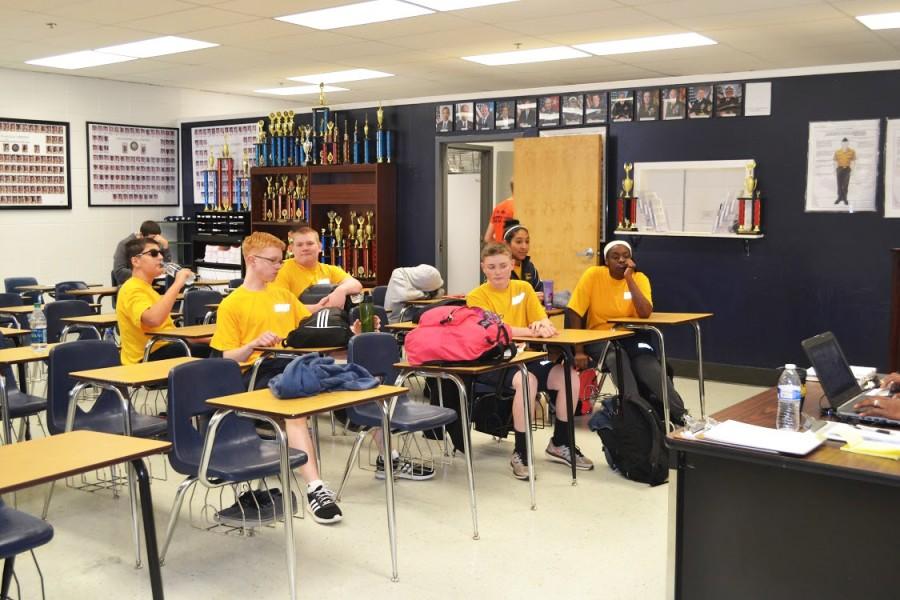 Coming in from vigorous physical training, the JROTC class takes a rest, drinking water and relaxing. Freshman Samantha Martinez says, “I like PT because it teaches us to not give up on ourselves. The more PT I do, the more I want to push myself mentally and physically.”