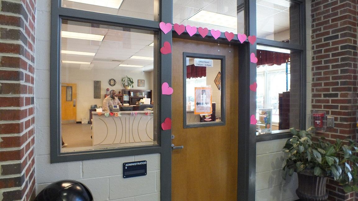 Admin. 2 could win hearts with their simple, yet effective door design. “The door definitely is my favorite. First there were just hearts but then we added the cupids, which really stands out from the other offices,” said junior Jayla Liner. 