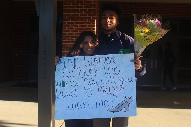 Junior Manoah Johnson “promposed” to junior Judy Beddawi before first period with flowers, and a poster saying “You’ve traveled all over the world… now will you travel to prom with me?” She said yes.