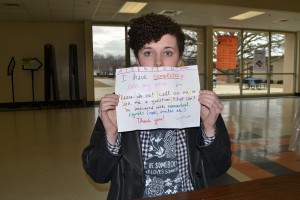 As one of the many students to get sick, junior Darby Franks must now carry around a sign notifying people that she has lost her voice.