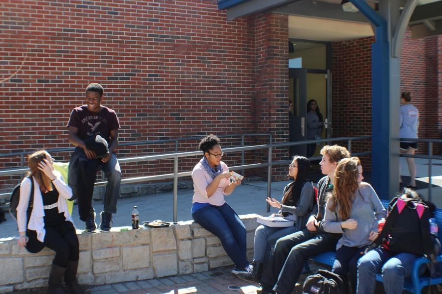 “We’re sitting outside because its sunny and nice. I love the sun,” said sophomore Kayla English.