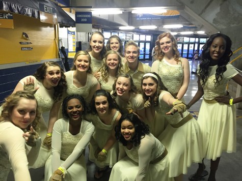 The winter guard takes a funny picture after receiving 8th place at championships. “I loved performing with all of these girls. They are like my family,” said Katie Bearden.
