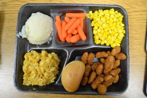Main Dish: Popcorn shrimp with mac & cheese Sides: Mashed potatoes, corn, carrots, and an apple
