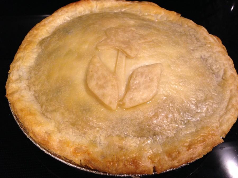 The+finished+turkey+pie%2C+featuring+a+flower+on+top%2C+sits+ready+to+be+devoured.
