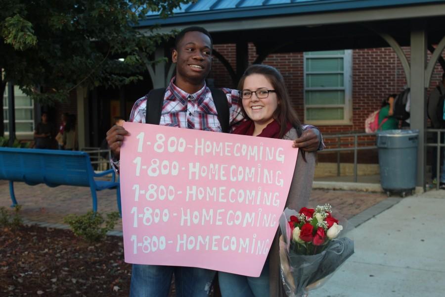 Its homecoming season, and the only better part of homecoming than football games in the stadium on Friday nights are the homecoming-posals (like a prom-posal but during homecoming). Sophomore Christophe Cesar and Chelsea Scarborough are pictured here after an exciting proposal in the courtyard this morning.
