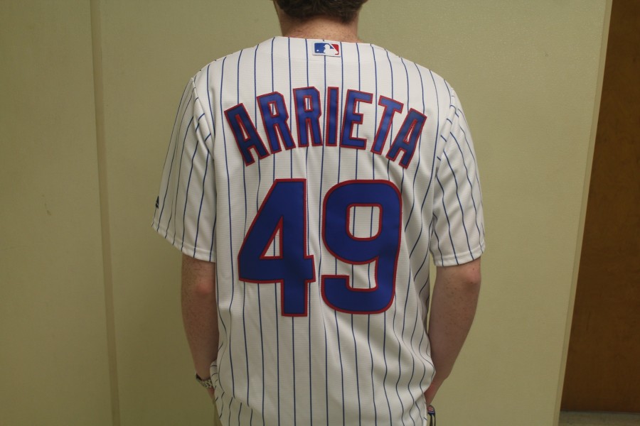 A+Cubs+fan+shows+their+pride+by+sporting+the+jersey+of+their+favorite+player%2C+number+49+Jake+Arrieta%2C+to+school.+The+Cubs+are+predicted+to+triumph+in+NC%E2%80%99s+Major+League+Baseball+wild+card+preview.