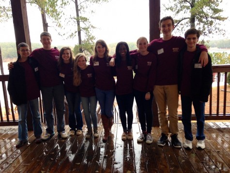 Local high school students and Transfiguration ChrisTeen members bond at a church retreat, including North Cobb alumna Catherine Lamb. The church hosts retreats for various grade levels to encourage parish bonding and spread the good word. Church member and NC junior Josh Joines reflects on his time on a retreat: “The retreats really made me think about my spiritual life and where I stood for a whole weekend, and they help me get involved with the church.”