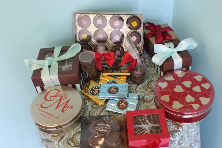 The assortment of cookies are wrapped decoratively for the purpose of being sold as gifts for family and friends.
