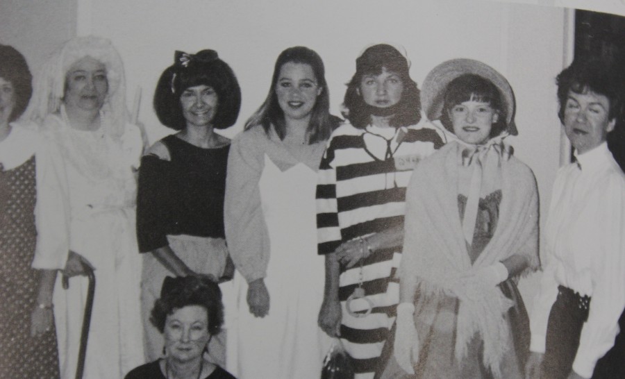Students and teachers alike dress up for Halloween and pose for a picture in the 1991 NC yearbook.