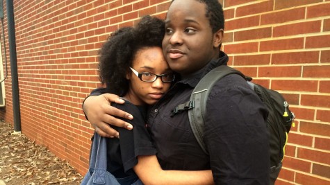 Williams embraces his significant other Harris between classes.
