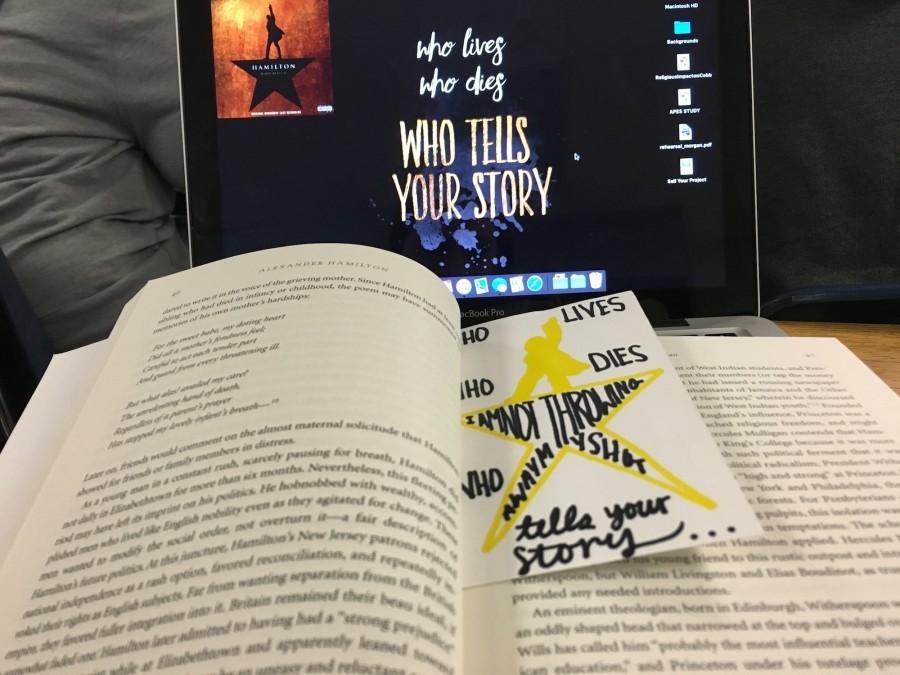 A student displays her love for this musical by setting her background as a line from the show, listening to the music, buying a fan-bookmark, and reading the book that Hamilton was based off of. 
