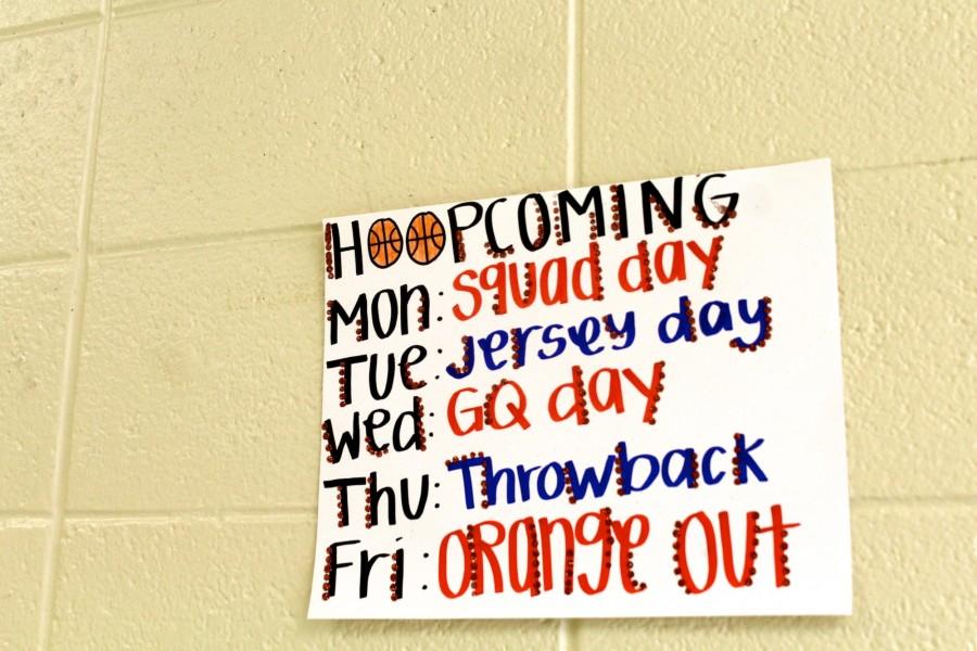As Hoopcoming week approaches, signs appear in NC hallways. Hoopcoming shares similarities with football’s homecoming in that it encourages students to dress up for spirit week. 