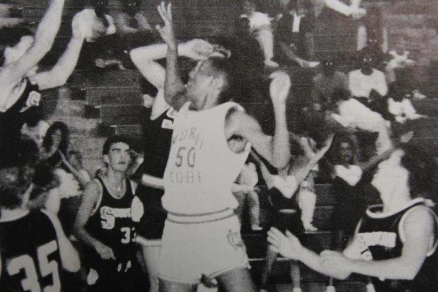 A 1991 NC basketball player feels determined to make the shot. 
