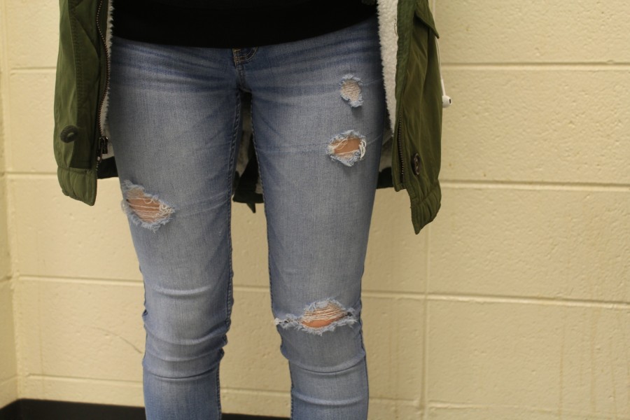 Rips in jeans are less distracting than being publicly shamed for having them.