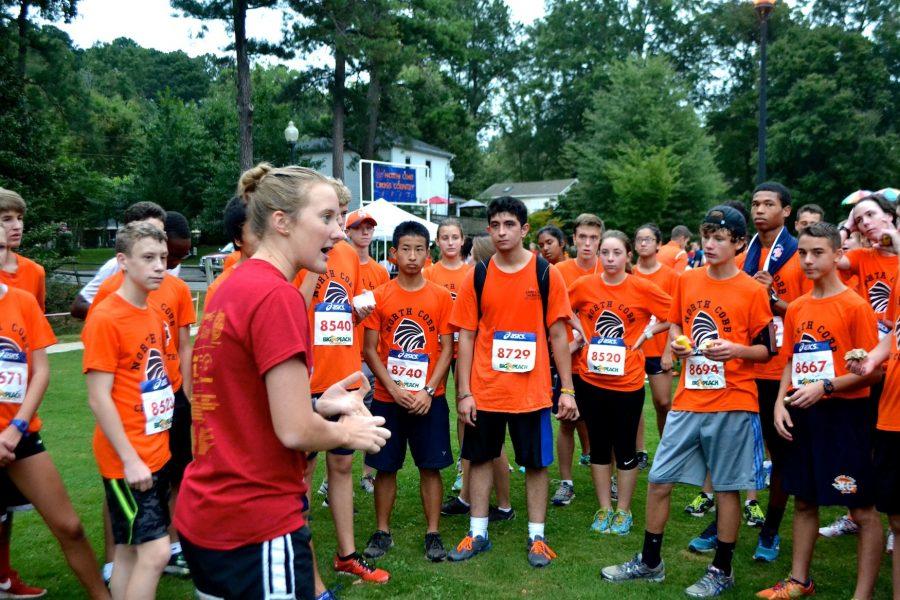 Head Coach Sarah Bowling leads her team of runners at NC’s annual Warrior Way 5K. After two years of coaching the team, Bowling decided to leave NC and follow her husband as his job takes him across the country.