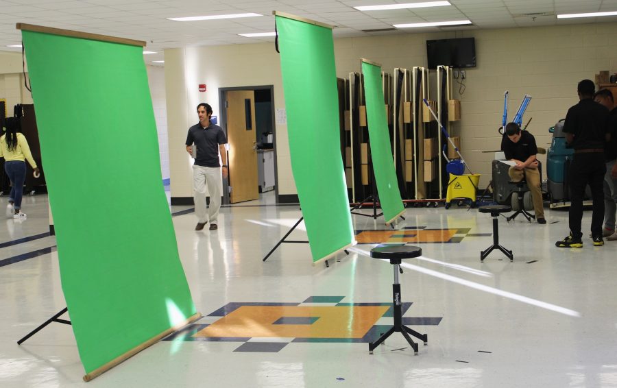 While+students+grade+9-11+took+normal+pictures+for+the+yearbook%2C+the+NC+seniors%2C+who+took+their+yearbook+photos+over+the+summer%2C+showcased+their+creative+side.+Seniors+Kamree+Moore+and+Cameron+Davenport+created+fake+grills+and+posed+with+money+for+their+pictures%2C+while+senior+Stephanie+Smith+brought+her+beagle%2C+Bonnie%2C+to+school+for+a+quick+selfie.