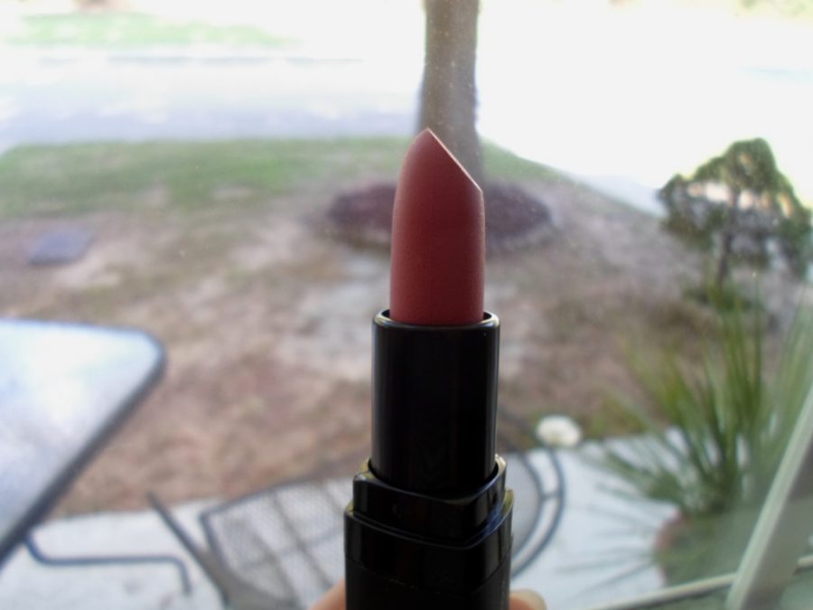 This lipstick works its magic with vibrant color and a bit of shine.