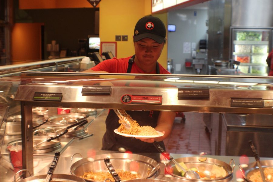 Katie Yang serves every customer with a smile even though she has a million things on her mind. This makes simple tasks such as plating a plate very difficult. However, Yang composes herself and continues to focus all her attention on the demands of her customers.”The customer always comes first at Panda,” Current Panda Express Employee Katie Yang said
