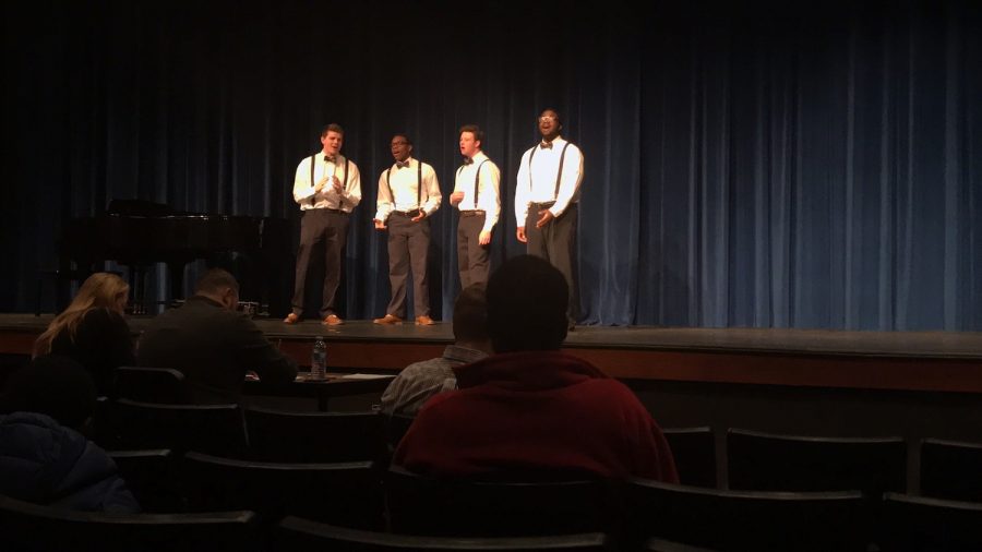 Senior Sean Lubbers, senior Perry Slaughter, junior Wesley Grant, and junior Jeremiah Franklin perform in the quartet for the regional Literary Meet.