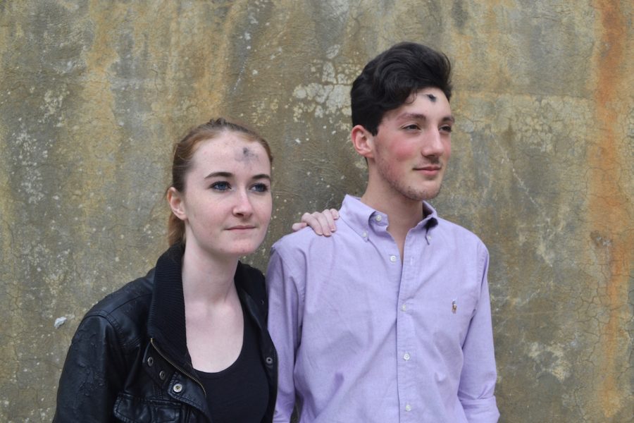 Two NC students boast ash on their foreheads in honor of Ash Wednesday.