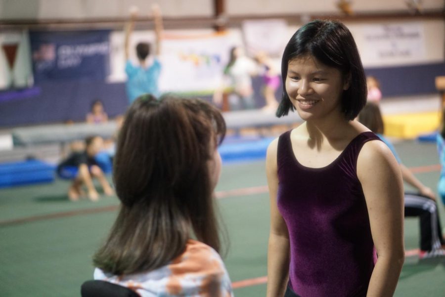 King smiles with one of her Special Olympians at the Chattooga School of Gymnastics and Dance. After a hard day’s work at practice, King and her students are content with the work they have done. This bright smile is usually seen on King’s face when working with the athletes in the gym.