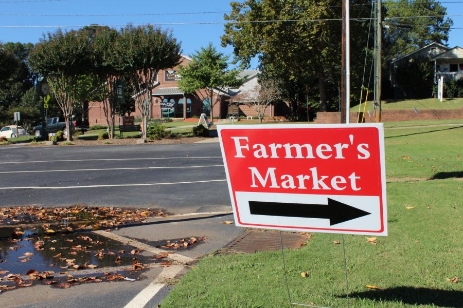 Pointing customers towards the Farmers Market at the Kennesaw Depot Park parking lot, the market offers a wide variety of items that will satisfy every shoppers wants and needs.