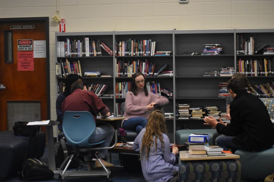 The Model United Nations team spends their Wednesday morning in the library, perfecting their argumentative and diplomatic craft.