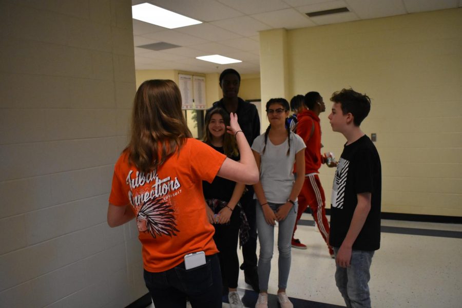 Sophomore Gabby Gilchrist tours Palmer students around The Freshman Academy. Students show engagement and interest and ask questions about their future school’s environment. “The kids were super fun to tour around the school,” Gilchrist said.