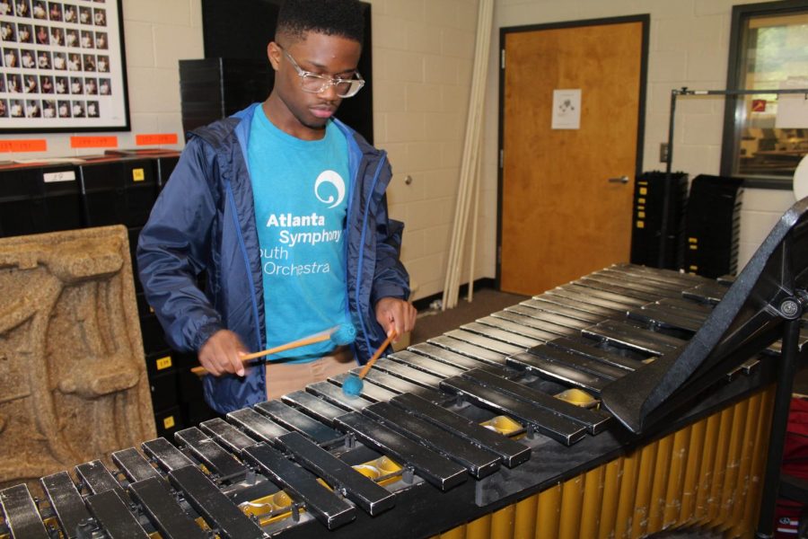 Junior, Kobe Lester plays the marimba, one of at least nine instruments that he plays in the percussion section. As he participates in the Atlanta Symphony’s Talent Development Program he hopes to improve his skills as well as helping inspire others in the program.