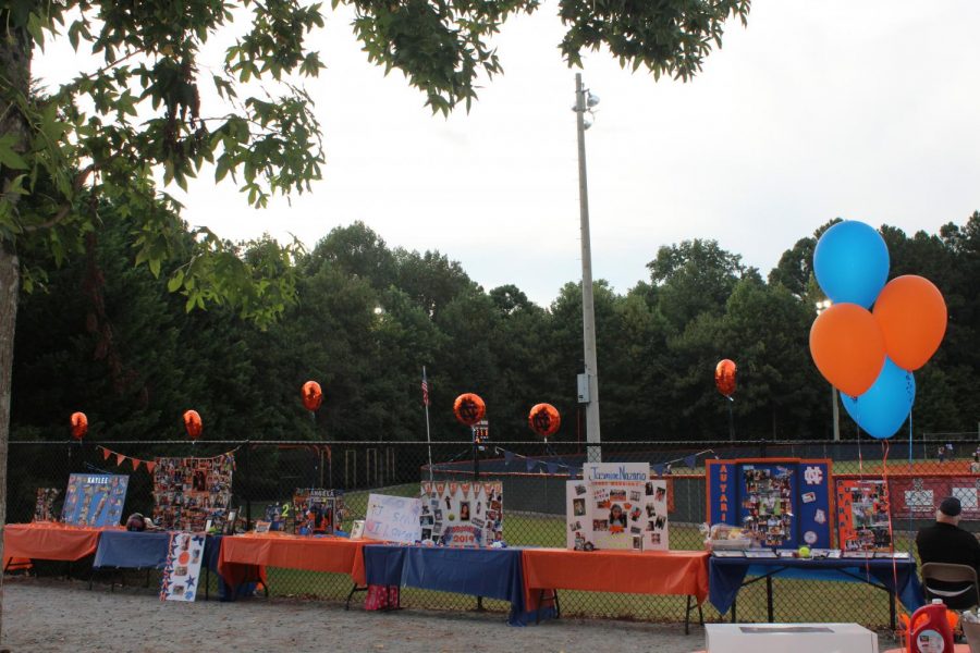 Posters honoring the senior members of the team adorned the gate surrounding the gate near the softball arena; balloon arches and flowers also lined the entrance to the field.