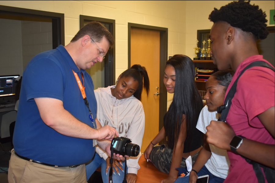 Knode instructs his Level 1 students on the basic functions of a camera, preparing them to carry on the legacy of North Cobb’s videography program. “I was a trainer at CNN for most of our projects, so [educating] was an actual fit for me looking into it,” Knode said. 