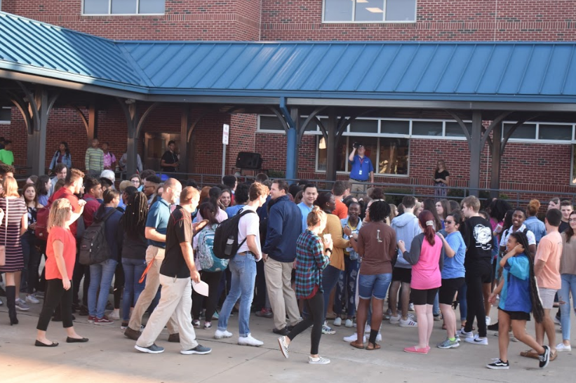 The NC Magnet students, namely juniors and seniors, participated in a flash mob this morning in the courtyard before homeroom. Dancing to Shawn Mendes’ hit song “There’s Nothing Holdin’ Me Back,” the flash mobbers brought out their best dance moves for Tomahawk Today, who filmed the carefully choreographed event. Hosted by Mrs. Husband and set up by seniors Zion Fitch and Emily LaPierre, the event took place to cheer up senior Brianna Hewitt, who just received a lung transplant. 