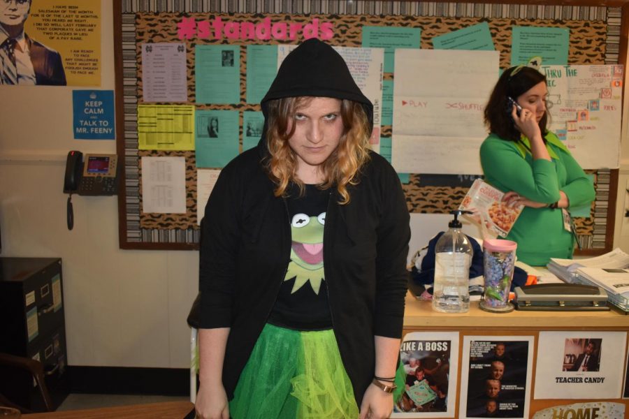 Today marked the second dress-up day of Homecoming week: Meme Fay. Students and teachers filled the halls dressed as today’s most popular memes. AP Lang and Honors American Lit teacher Lindsay Theaker dressed up as Dark Kermit from the movie Muppets Most Wanted. 