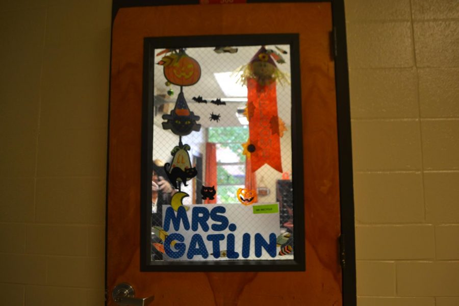 As the spirit of thrills and chills fill the air, administration and teachers alike deck the halls in vibrant Halloween decorations, such as Ms. Gatlin, who adorns her door with creepy decorations that have a whimsical spin. Though inspired by the season of scares, these cobwebs and cutouts bring a festive vibe to the halls of NC, and encourage participation in seasonal events like next Tuesday night’s “Scream on the Green,” which will bring the community together to celebrate the spirit of Halloween through movie watching and trick-or-treating. 