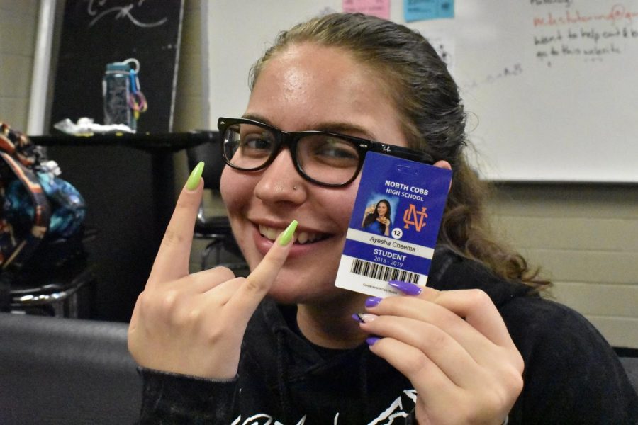 Senior Magnet student Ayesha Cheema decided to flash two slices of margherita pizza in her senior ID, which creatively summarized her senior year. The colorful toppings on the pieces of pizza made Cheema’s smile shine extra bright for her senior ID. Cheema works at Pizza Hut and claims to live off of pizza. “Pizza is basically my whole life,” Cheema said. 
