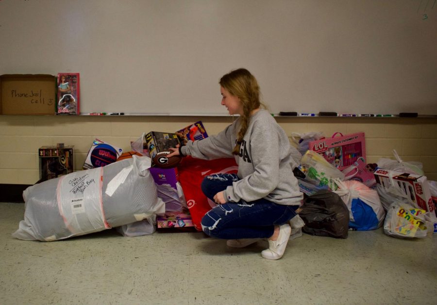 Interact Club, run by Coach William Hargis, collects Christmas toys to donate to those who cannot afford gifts this year. When students donate toys to room 210, Hargis gives them a gift-card for a free Chick-fil-A sandwich. 