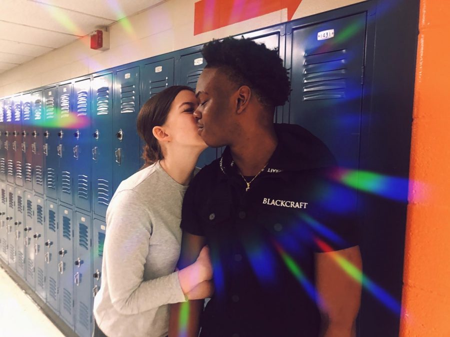 Two love birds give a quick goodbye kiss to each other on the way to their next class. PDA allows students to learn how to act appropriately but also how to show others they care for their significant other. Keeping it simple makes it far more acceptable.