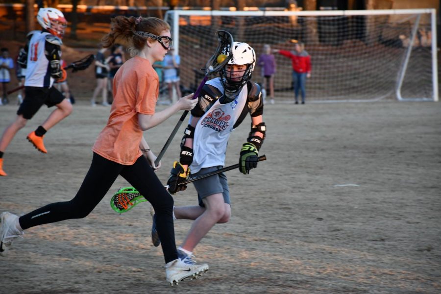 The girls scrimmaged the boys for the first time after practice on Friday, February 1. After spending a little over an hour on the field, both teams received important practice on the field for their upcoming games in the spring season.