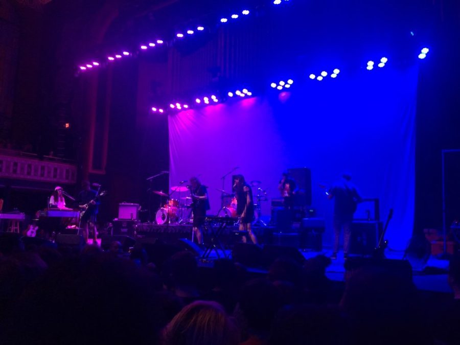 King Gizzard and the Lizard Wizard setting up for their set at the Tabernacle. Stu McKenzie checks guitars and Ambrose Kenny Smith checks microphones.