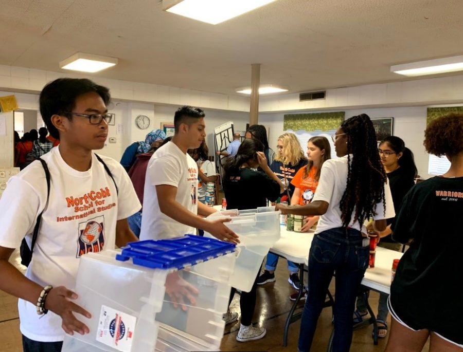 Volunteers from the magnet class of 2020 headed to Clarkston Community Center for a food pantry drive that caters to newly-arrived refugees and immigrants. Volunteers helped pack and stock foods, distribute diapers and donated clothes, and assist the refugees in filling out forms.