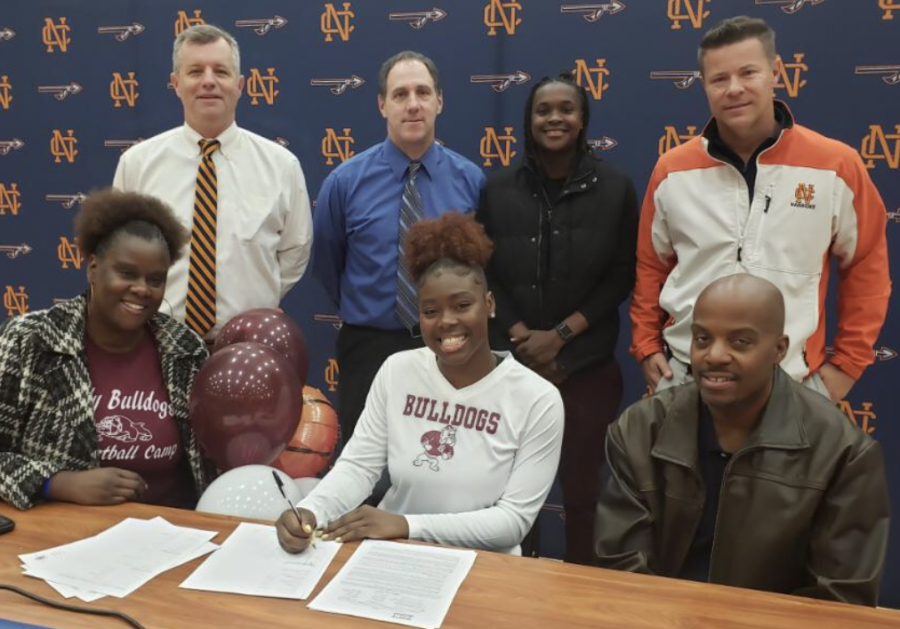 NC senior Azonya Austin signed with Alabama A&M on November 13, at a ceremony in the arena, surrounded by family, friends, and supporters.  After playing  NC basketball for the entirety of her career, Austin prepares for the transition from high school to college and reflects on what high school ball taught her. “It’s going to be a whole different atmosphere. College [basketball] is ten times harder than high school [basketball]. In high school, you just go to school go to practice and go home… [in college] my whole day will revolve around basketball, and on top of that, I have to be a student-athlete.” 
