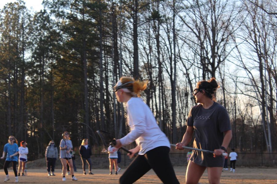 With the 2020 NC lacrosse season just around the corner, the NC girls Varsity lacrosse team prepares for their season by conditioning intensely every day, Monday through Friday. After failing to make it to playoffs this year, the Lady Warriors plan to come back stronger than before thanks to new and returning players and a stronger bond as a team.