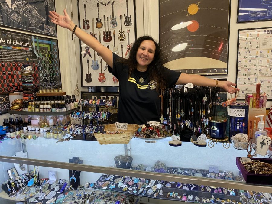 Pictured above, Deb Currans stands behind the front counter of her store, Starstuff, in Downtown Acworth; where she sells jewelry, clothes, and many other unique treasures. The glass case in front of her contains personally wrapped gems, each of which she made beautifully with care. 
