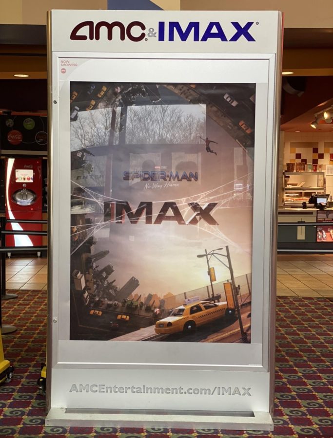 The latest Marvel movie, “Spider-Man: No Way Home” poster stands at the AMC Barrett Commons 24 in Kennesaw, GA. The star cast consists of actresses Thomas Holland, Zendaya, and Benedict Cumberbatch. The movie first showed in theaters on December 17, 2021 and still appears today.